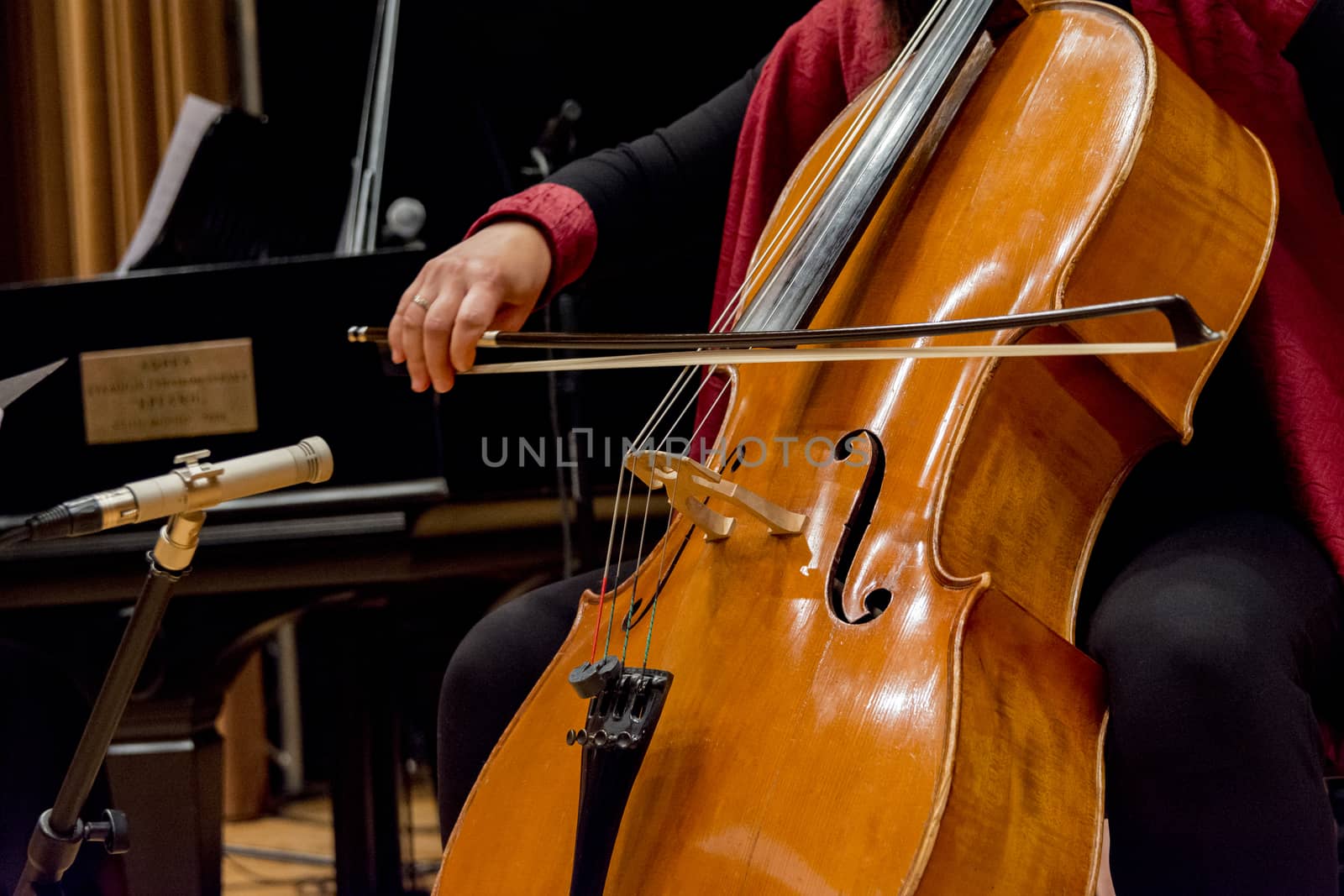 young woman plays cello