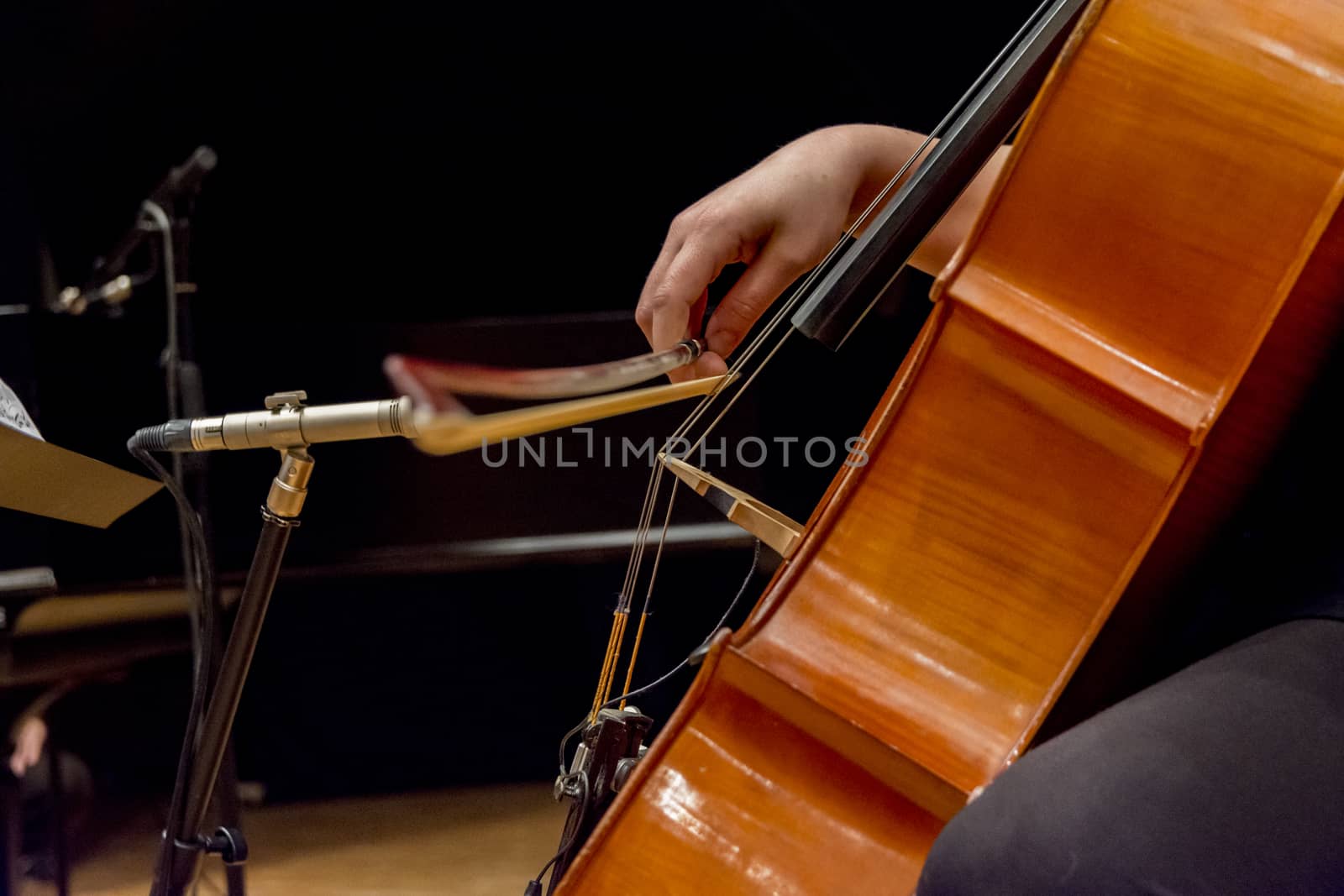 young woman plays cello