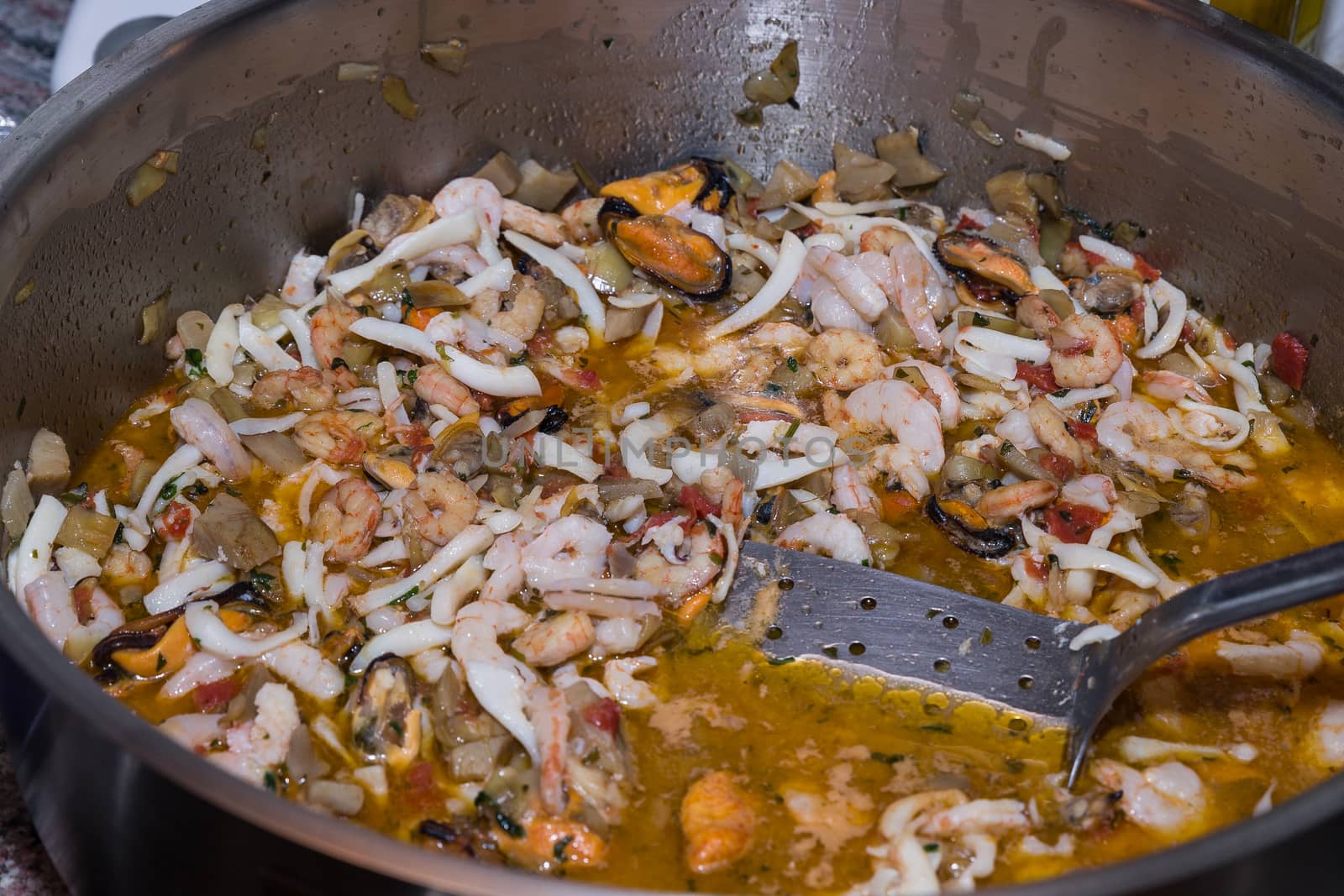 A big pot of traditional Sicilian seafood with delicious mussels.