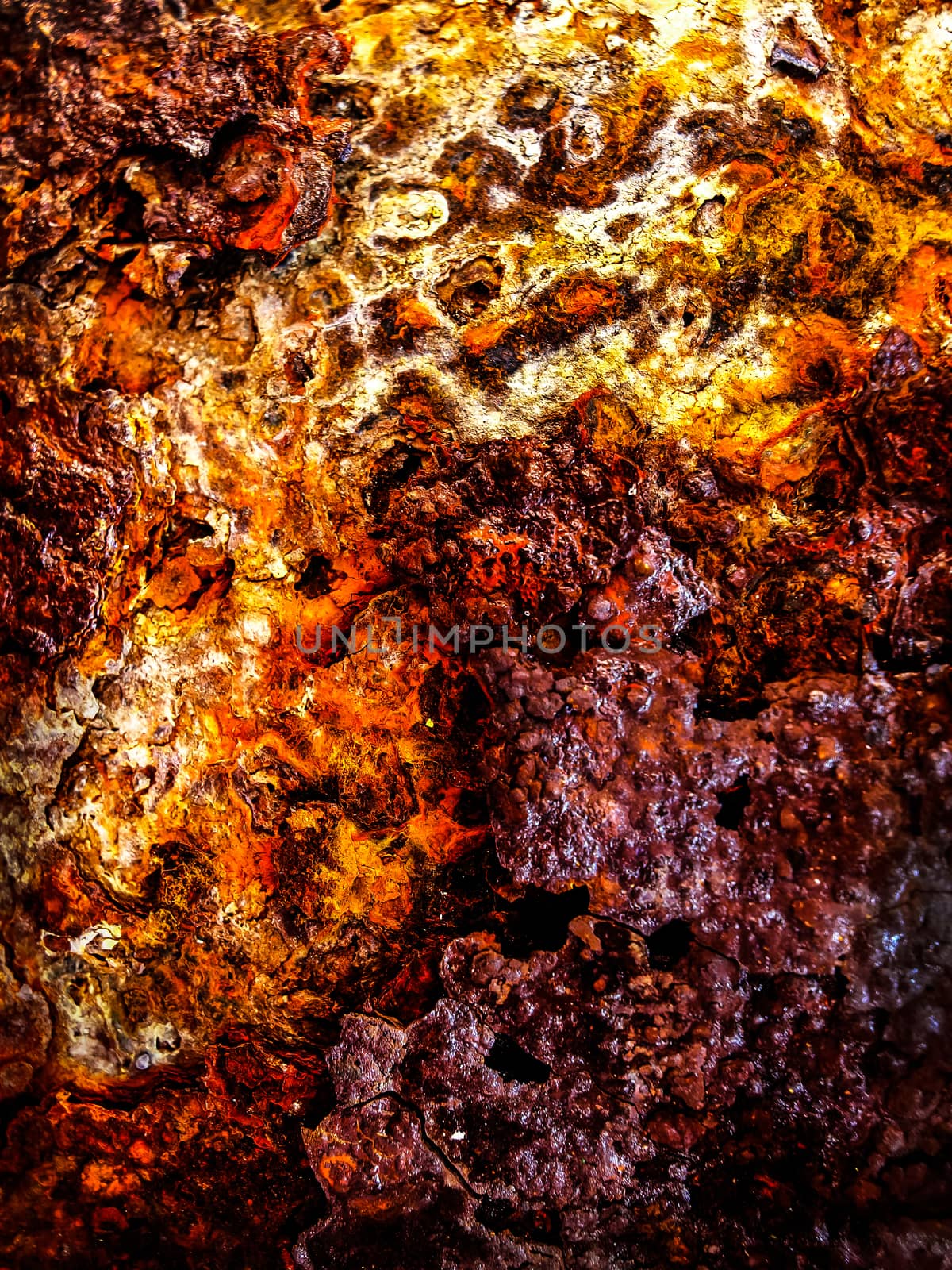 Red and yellow of grungy rust on raw steel background