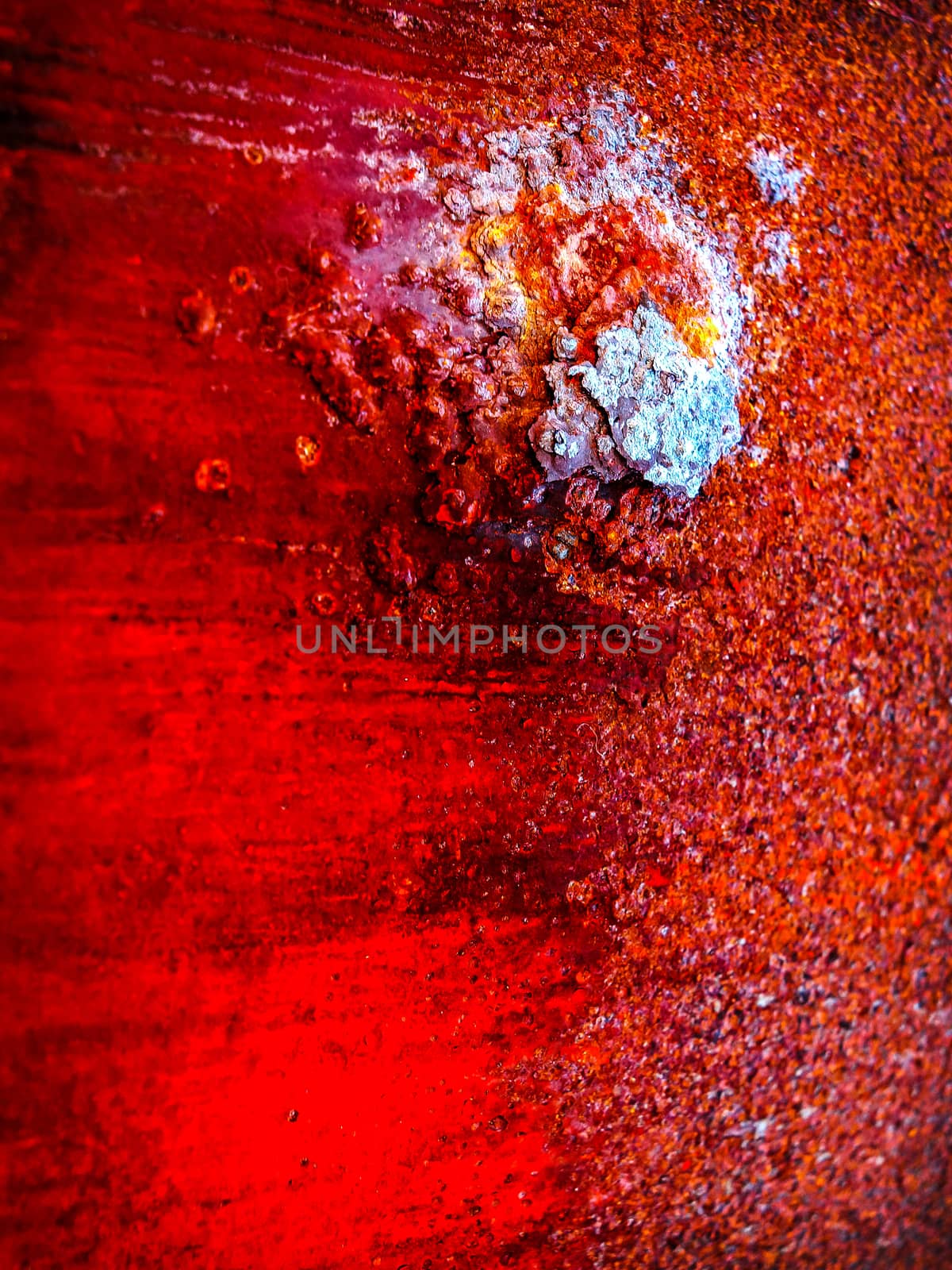 Red and yellow of grungy rust on raw steel background