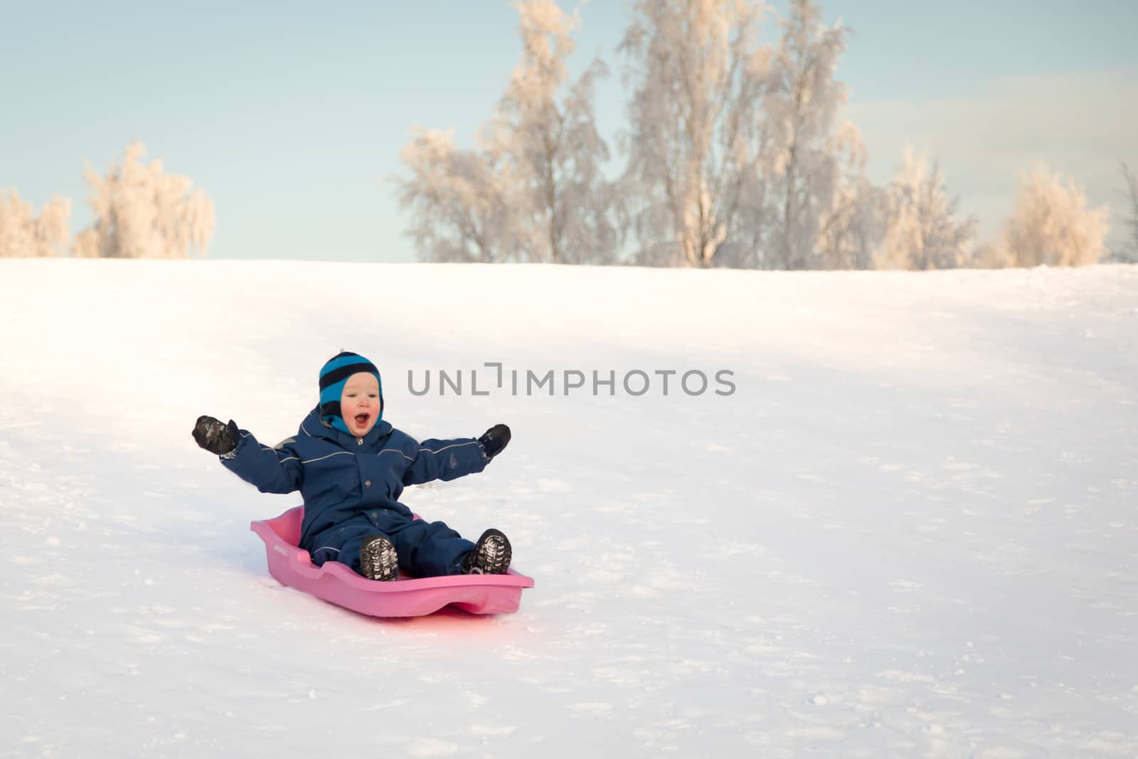 Boy and winter fun by leorantala