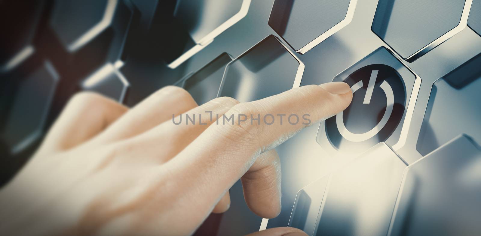 Finger pushing digital start button on a futuristic interface. Conceptual design of an innovative technology. Composite image between a hand photography and a 3D background.