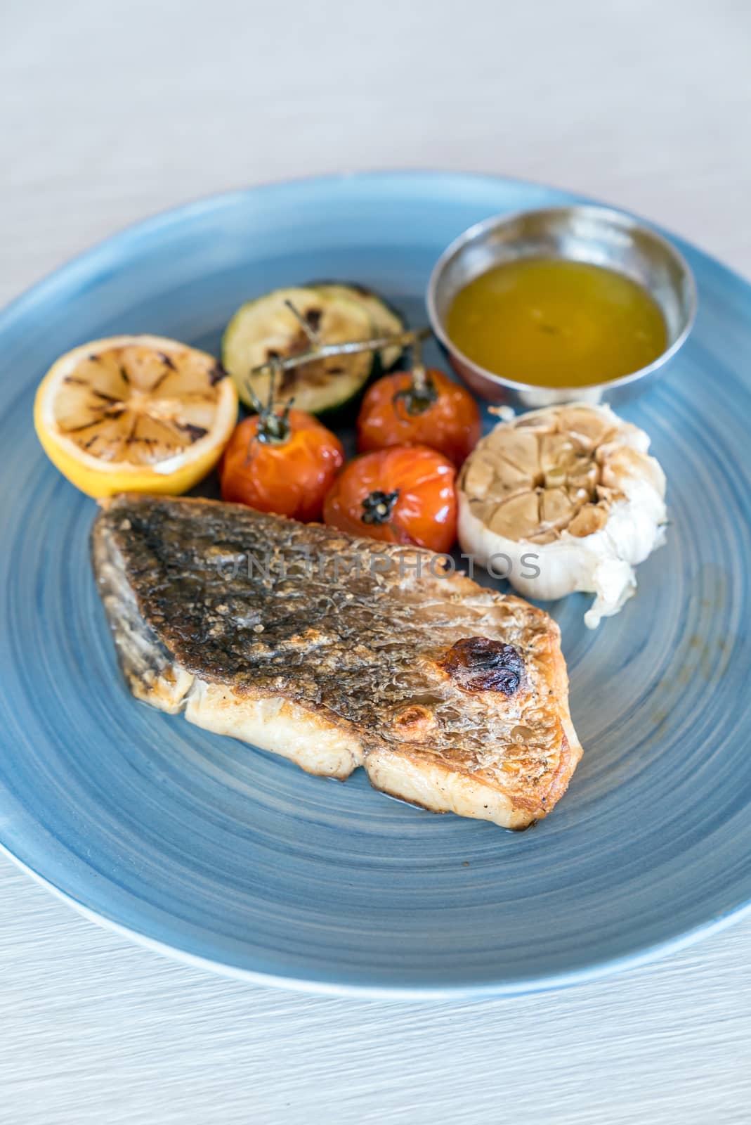 Grilled seabass fish  with grilled vegetable