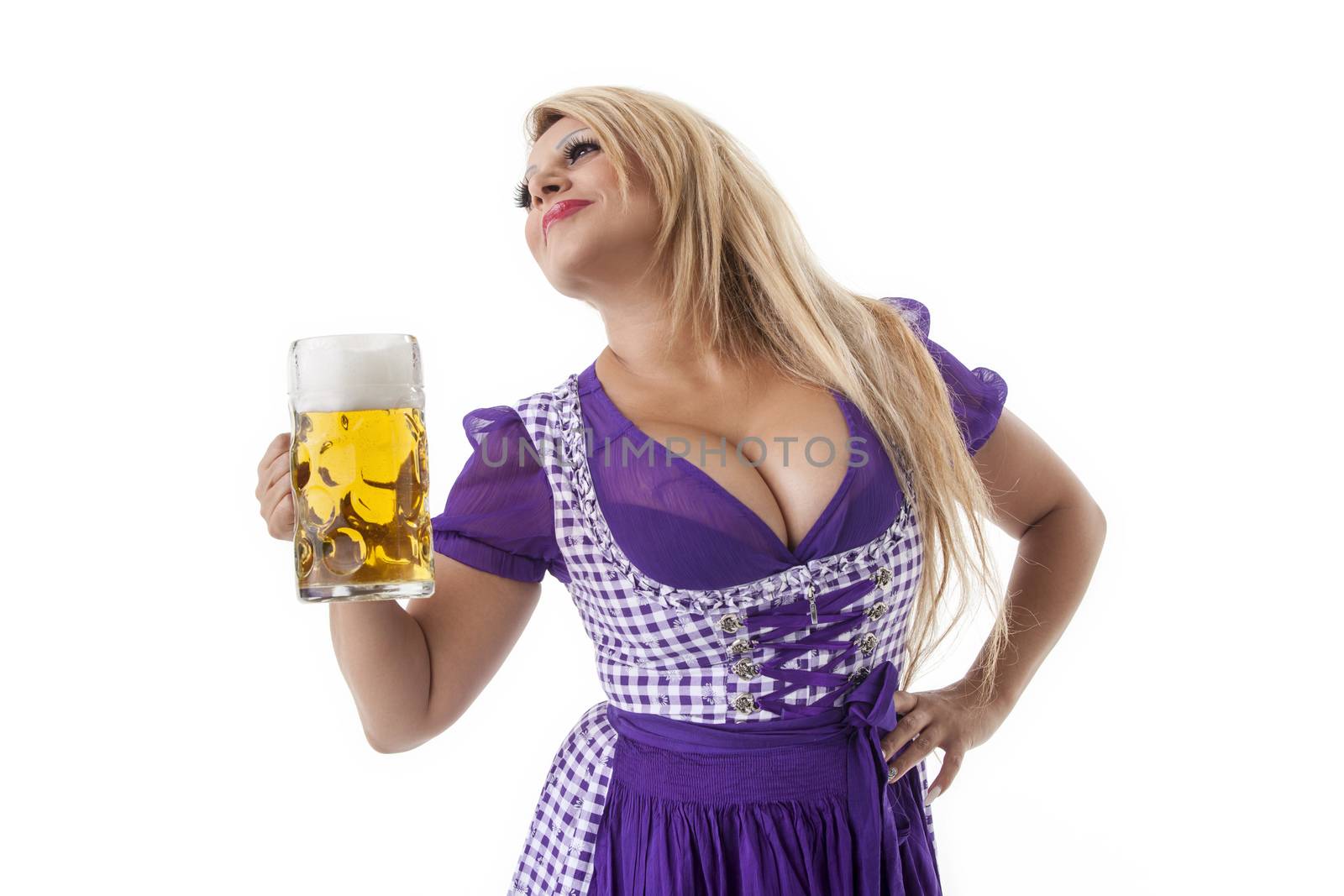 bavarian woman in a dirndl with beer