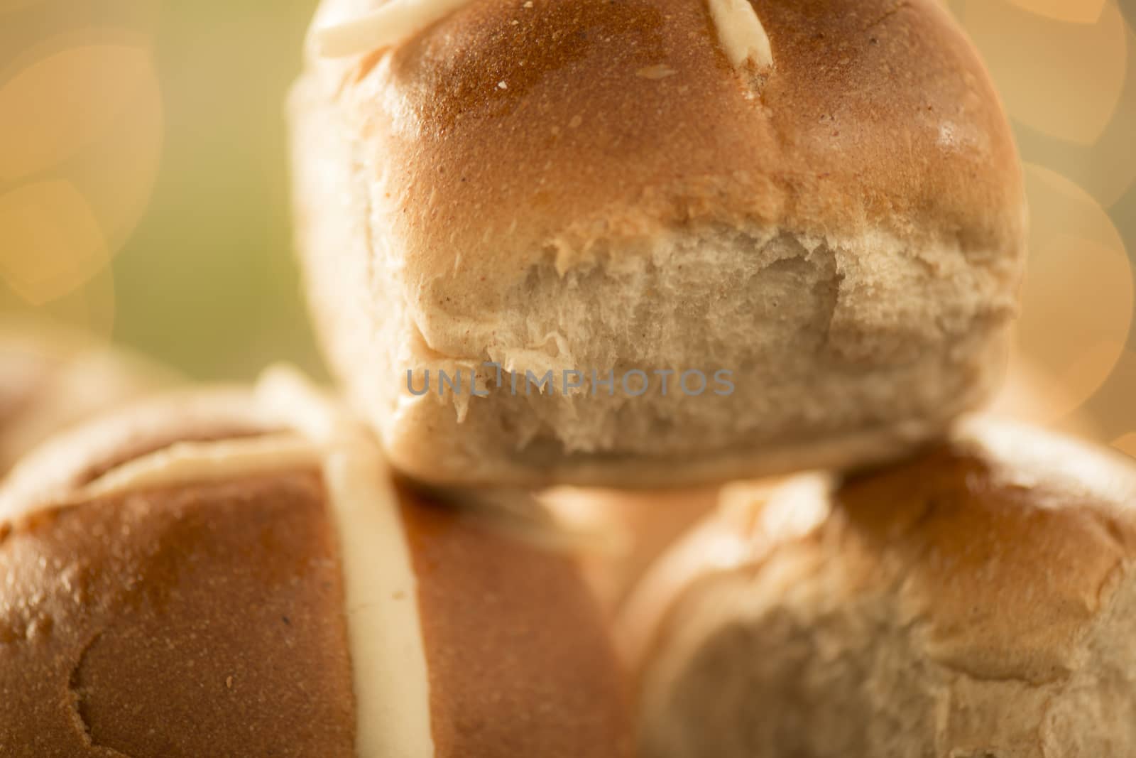 Tasty traditional Easter hot cross buns, closeup view.