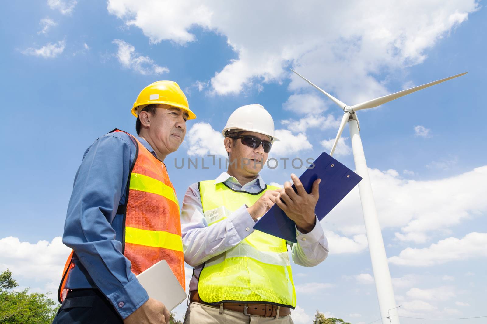 Engineer and Architect  working at Wind Turbine Power Generator by thampapon