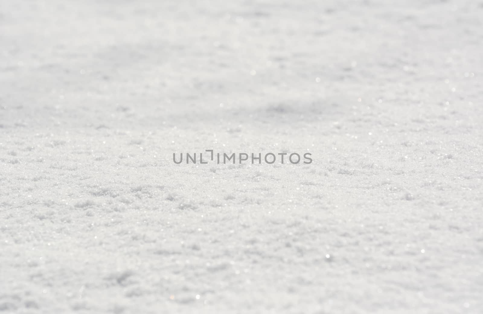 Fresh untouched snow in winter as an abstract background 