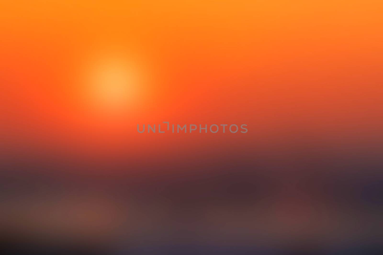 Orange sunset abstract blurred background by sengnsp