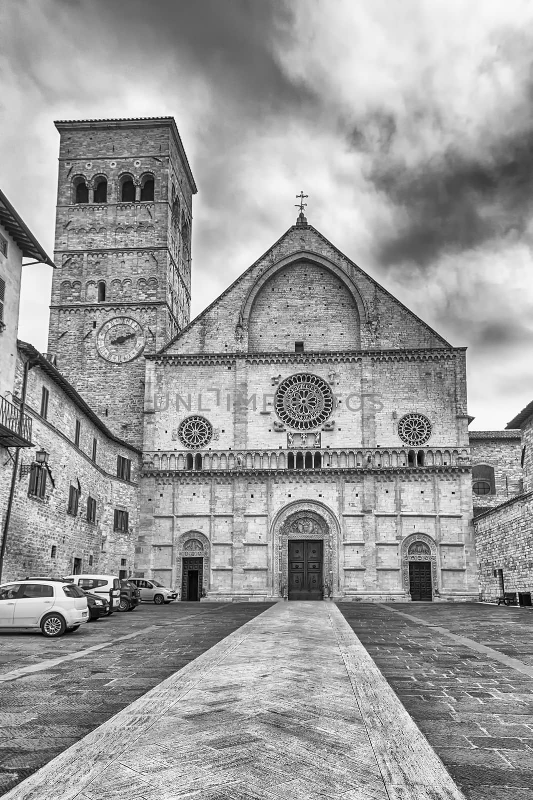 Exterior view with facade of the medieval Cathedral of Assisi, Italy. The church is dedicated to Saint Rufino
