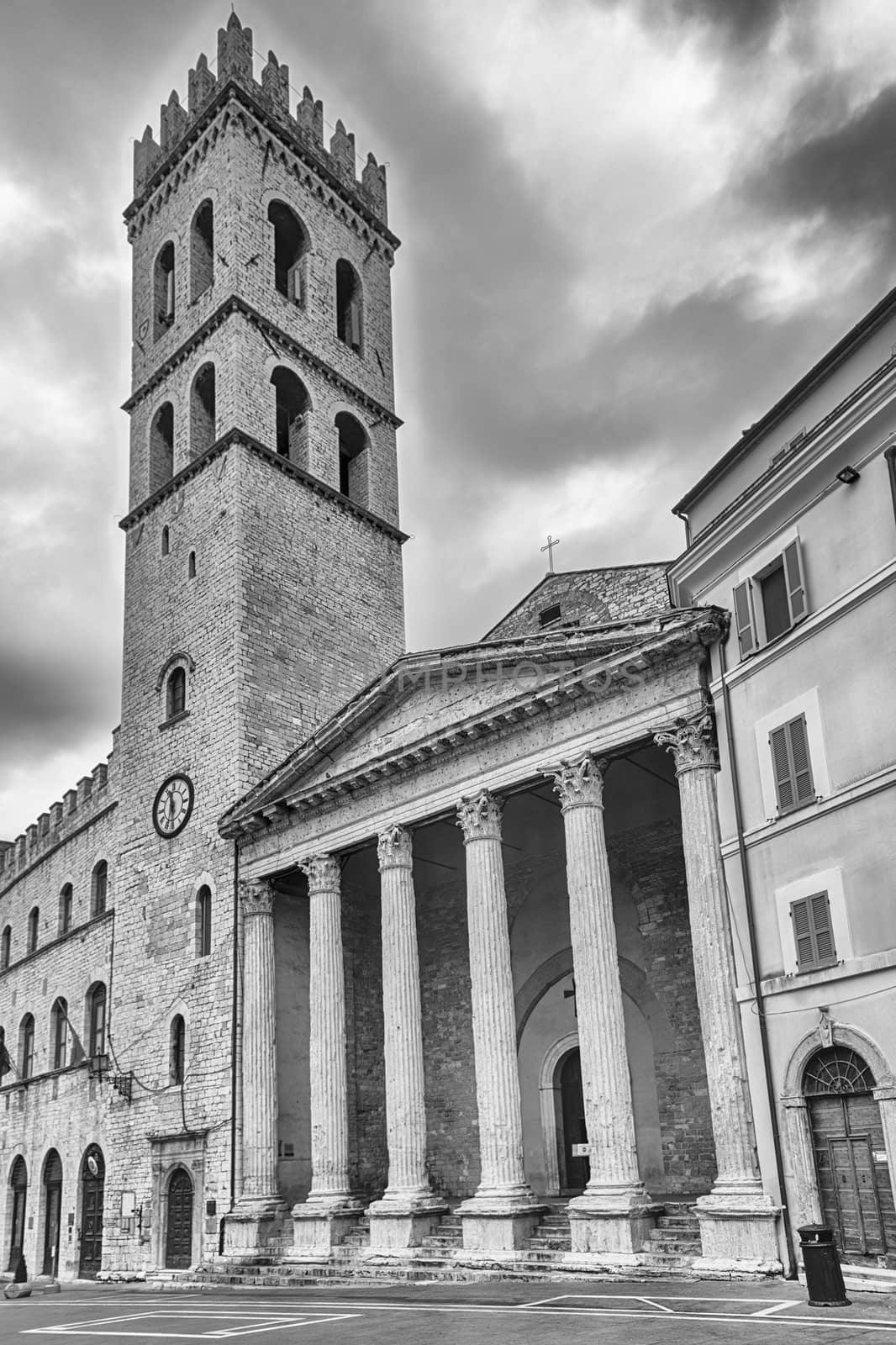 Facade of Temple of Minerva, iconic landmark in Assisi, Italy by marcorubino