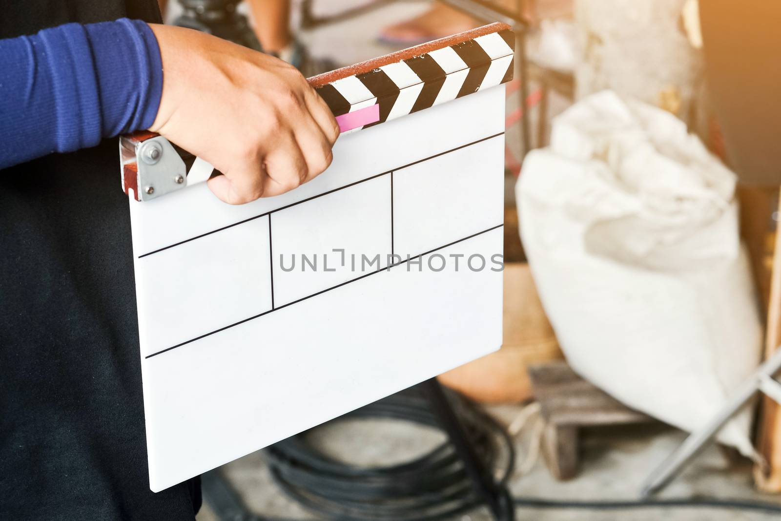 Film Slate, close up image of film production crew holding Film Slate on set