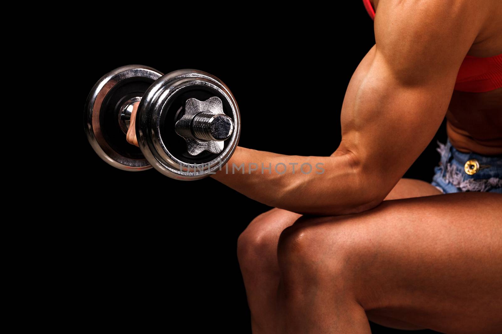 Fitness woman with dumbbell posing against black background, iso by Nobilior