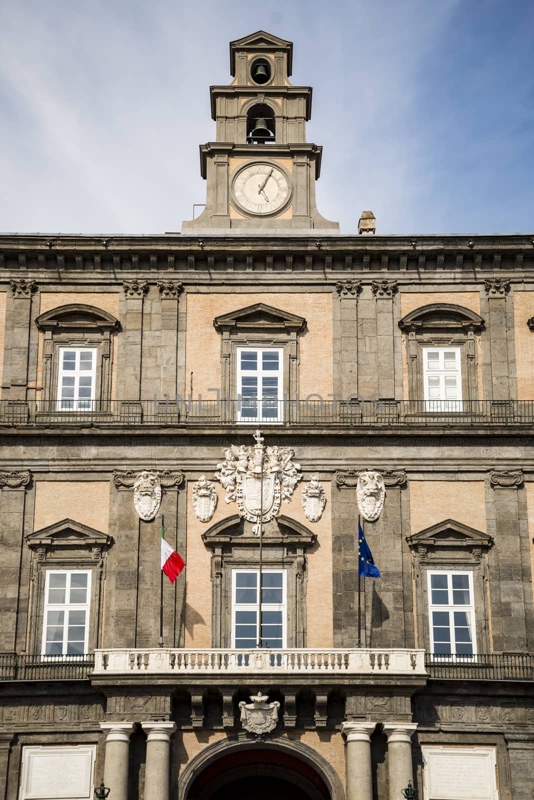 Facade of the historical Royal Palace in Naples, Italy