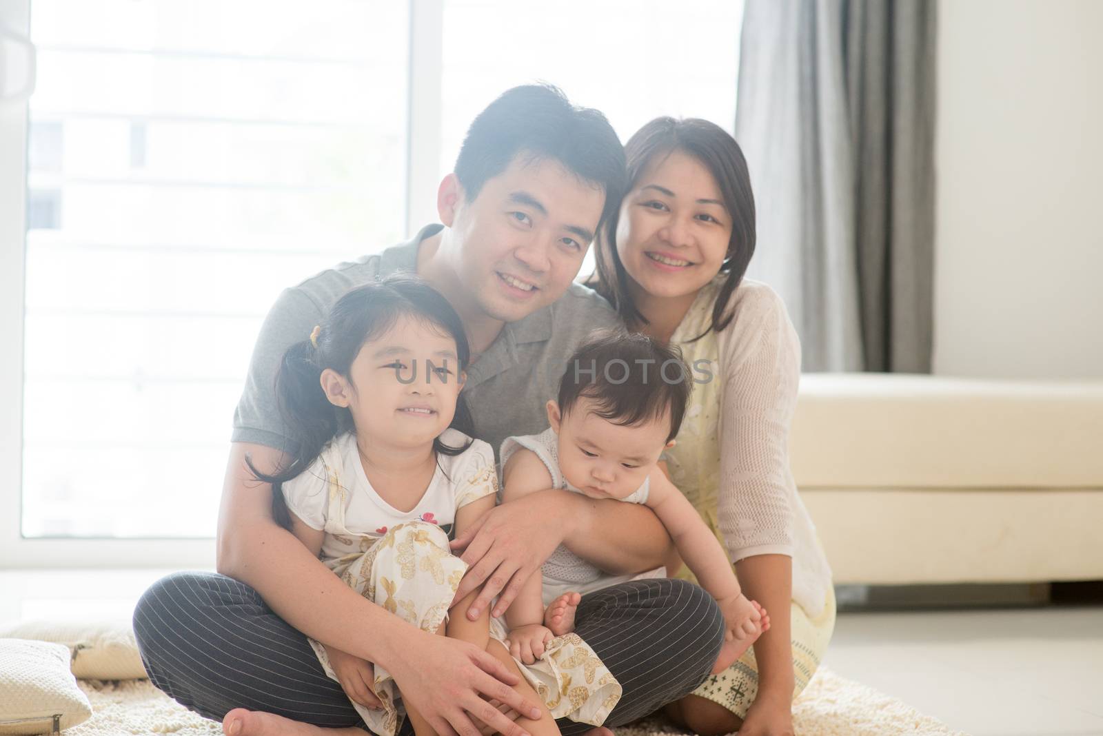 Portait of Asian family at home by szefei