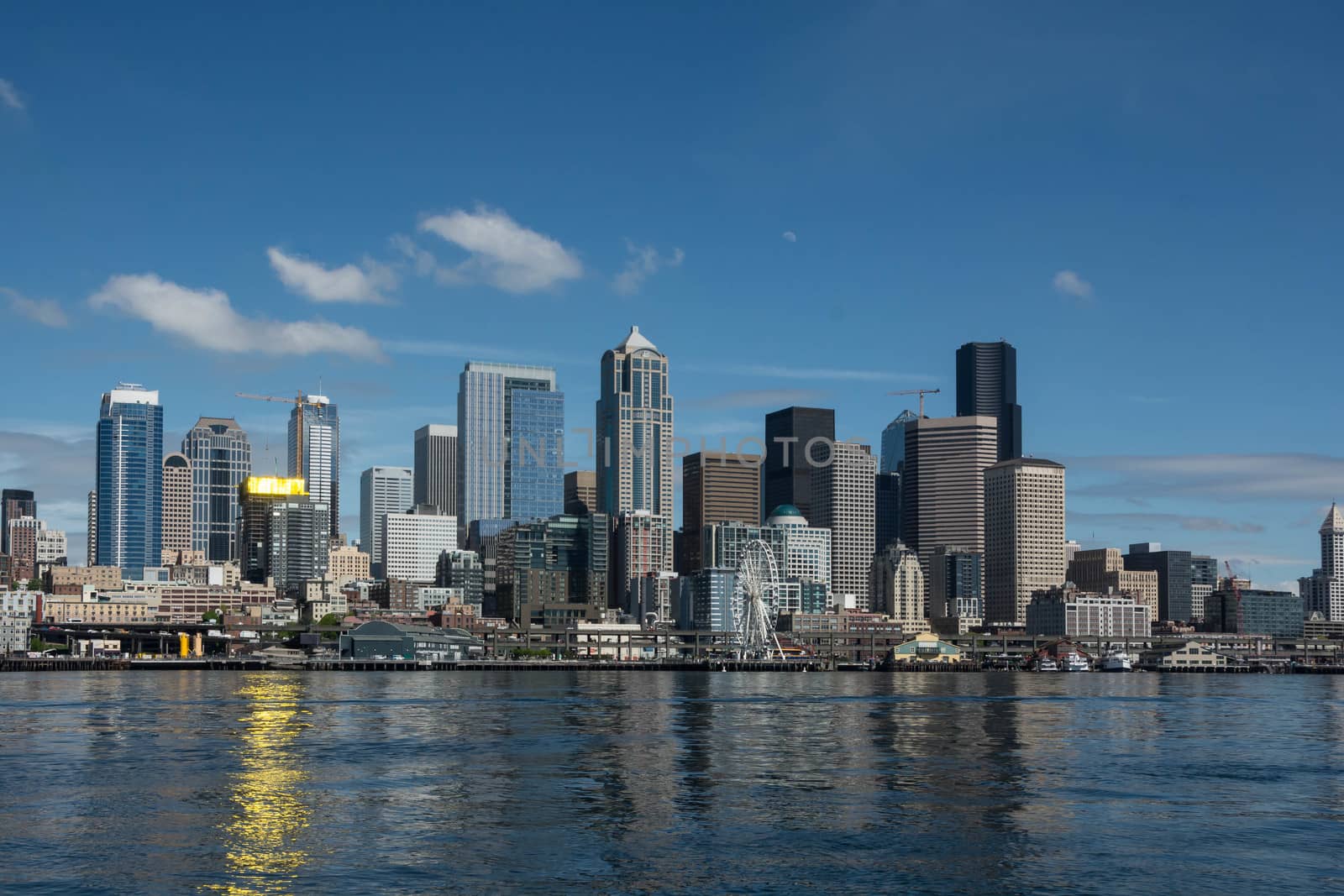 Reflections of Seattle on Elliott Bay by cestes001