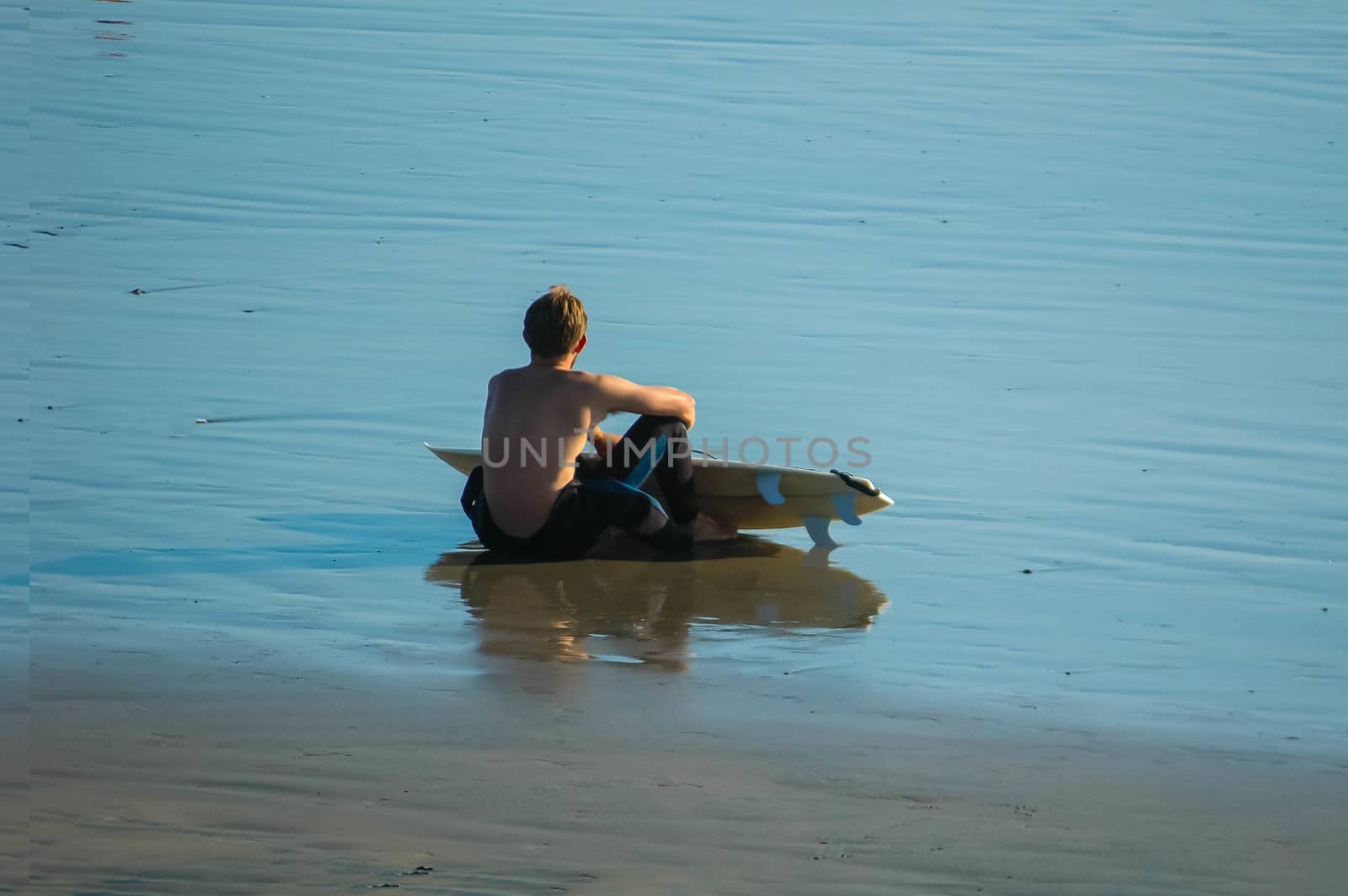 Surfer taking a break by cestes001