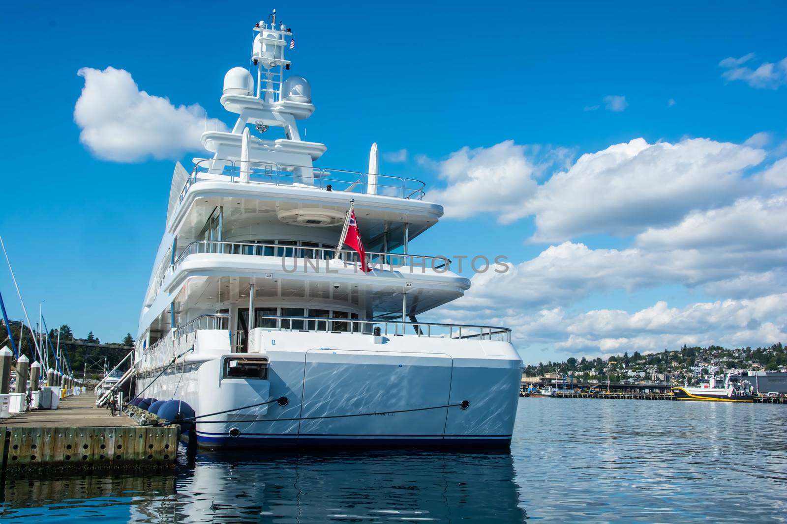 Mega yacht tied up at Seattle's Elliott bay Marina giving her crew shore time and provisioning