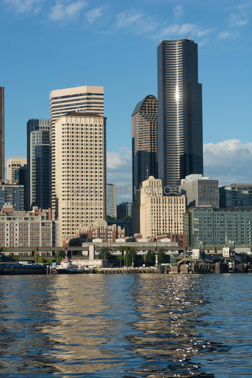 Reflections on Elliott Bay from several skyscrapers