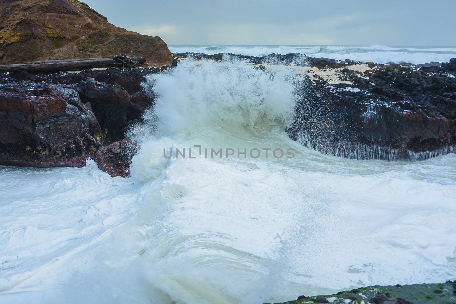 Wave action in narrow cut on the Oregon Coast.