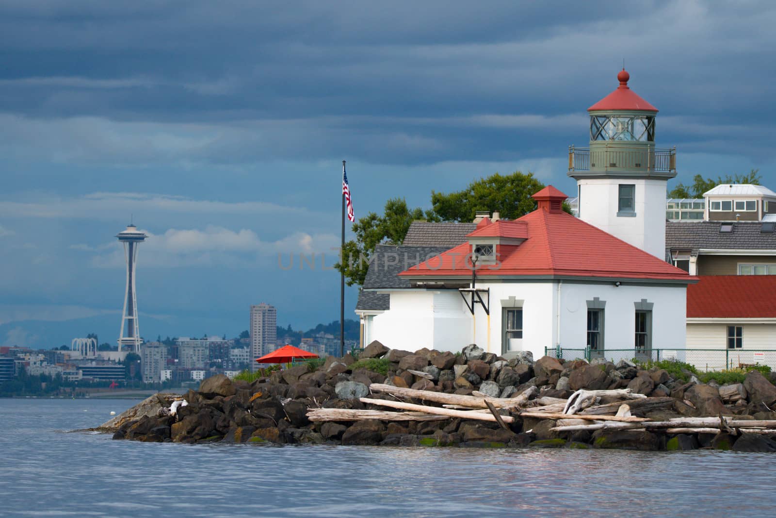 Alki Point Lighthouse and Space Needle on Cloudy Day by cestes001