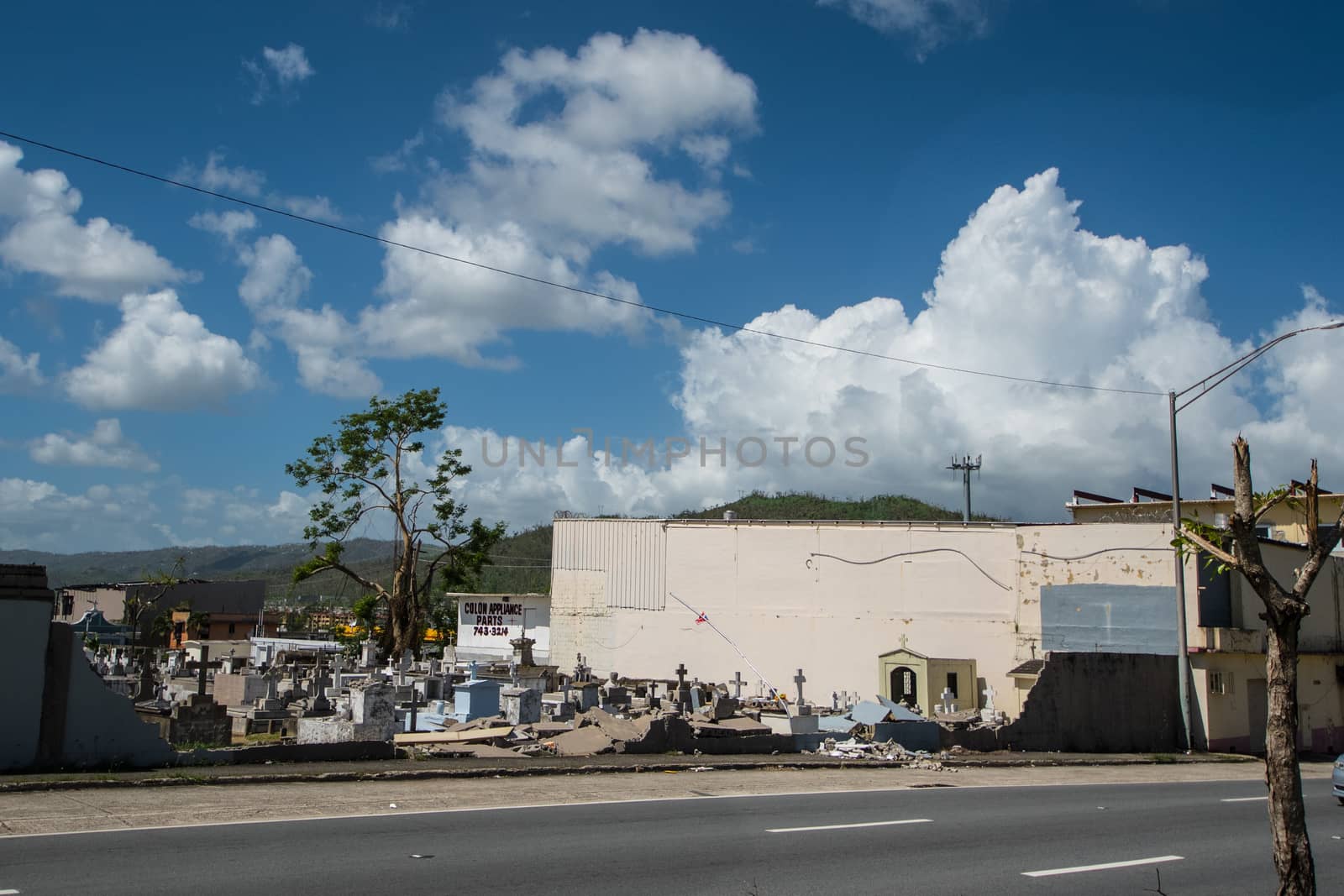 Cemetery wall collapsed from the force of Hurricane Maria's winds.
