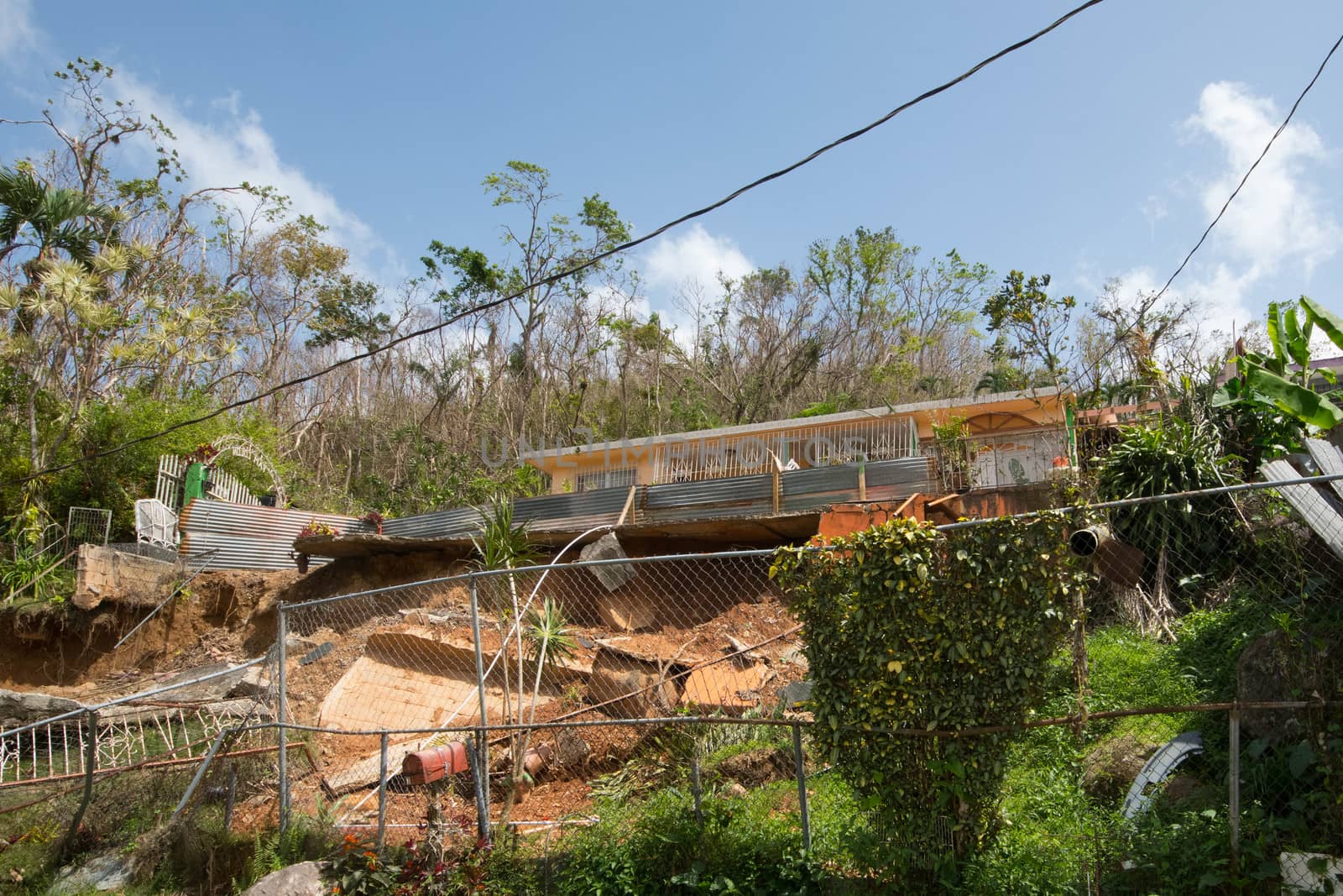 Mud slide on Puerto Rico road after Hurricane Maria by cestes001