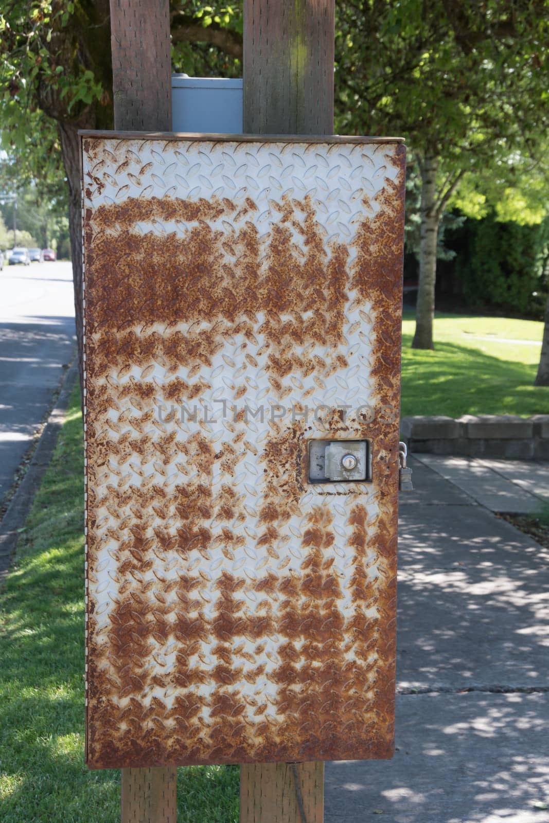 Rusted utiltiy box at park in small town, Washington State