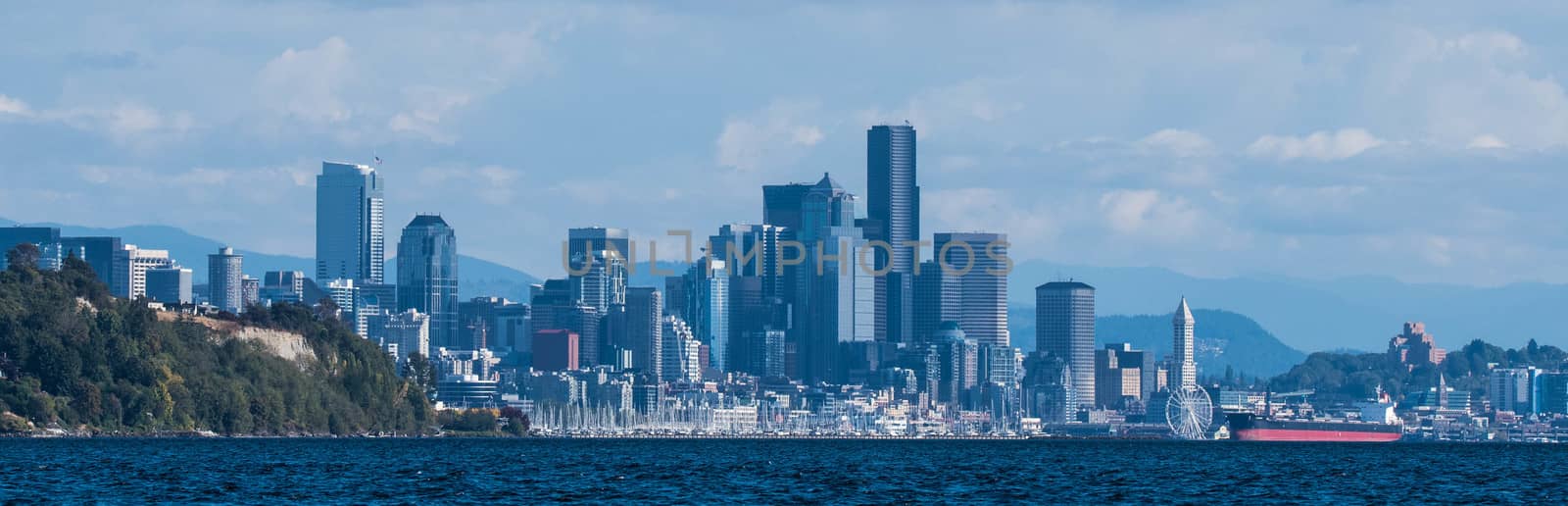 View of Seattle from Magnolia, taken from boat with Magnolia Bluff to the left and Smith Tower to the right