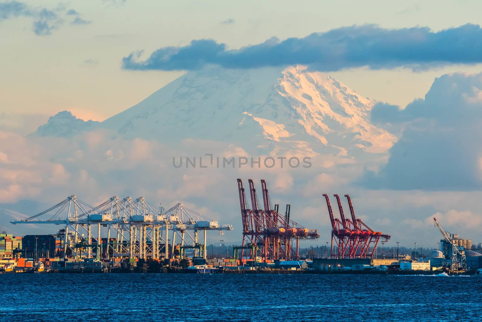 Seattle Container Terminal with Mount Rainier in the Background with clouds just before sunset