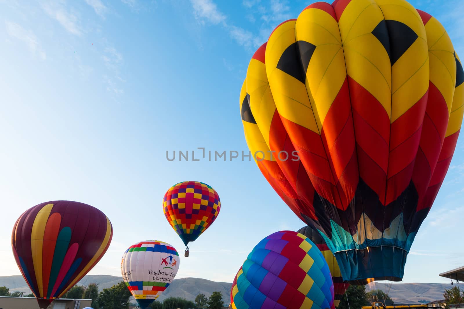 Every Fall, dozens of hot air balloons gather in Prosser, WA, for three days of ballooning and harvest festival
