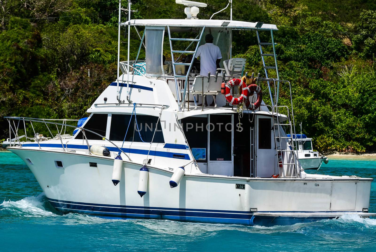 Charter fishing boat in British Virgin Islands heading in to pick up fishermen