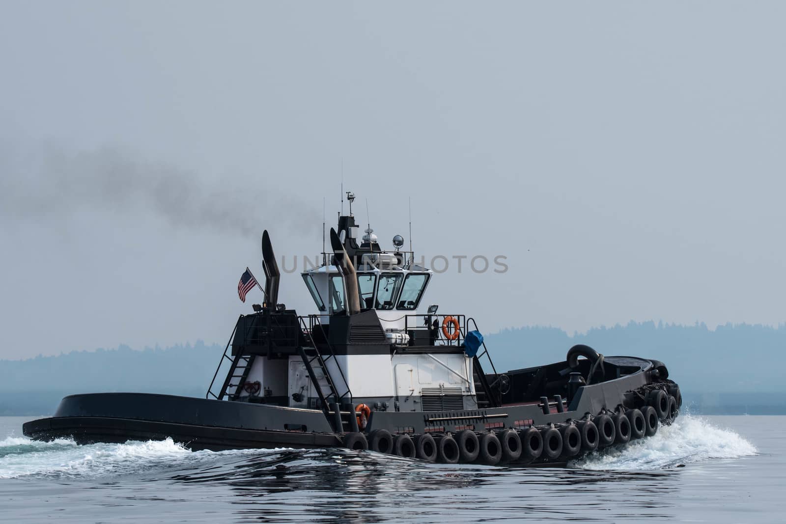 Ocean Going Tug transiting Shilshole Bay on the way north on a lightly foggy day