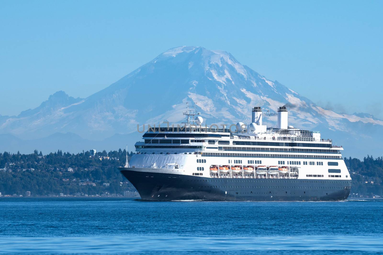 Cruise ship leaving Seattle on her way to Alaska with Mount Rainier in the background.
