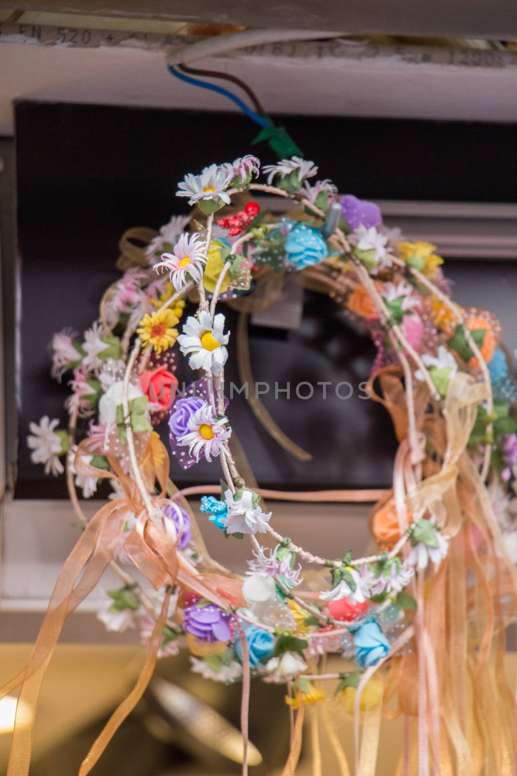 colorful crowns  for sale made of fake flowers