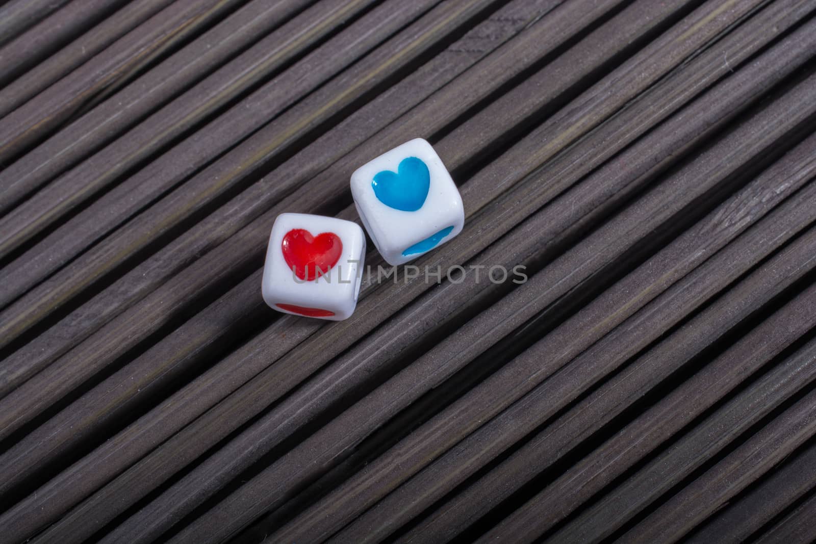Heart shaped love cubes  on a straw mat by berkay
