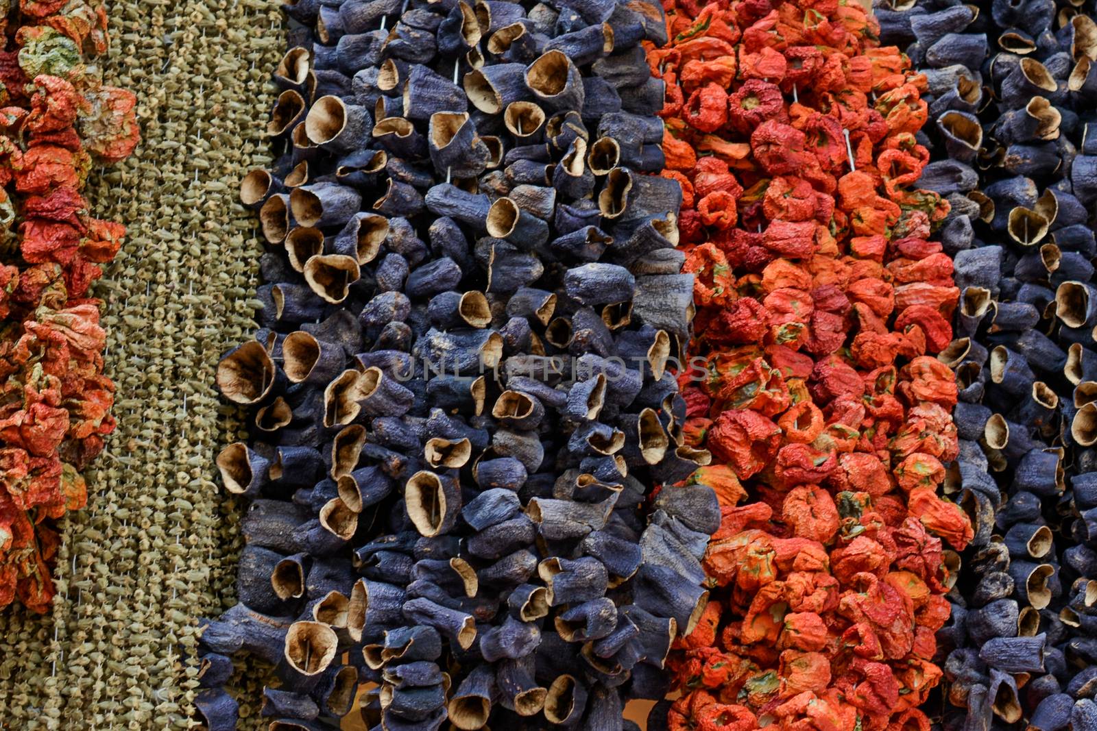 Dried peppers and aubergines and colourful spices by berkay