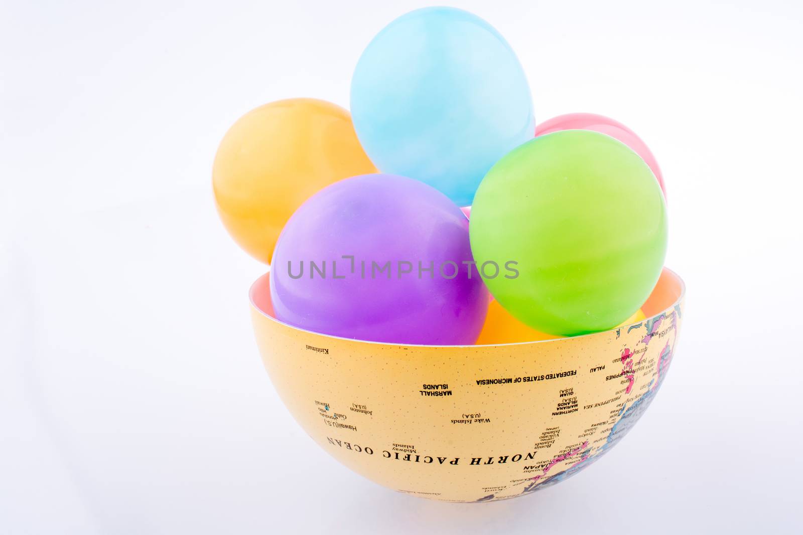 Balloons in a basket shape of globe