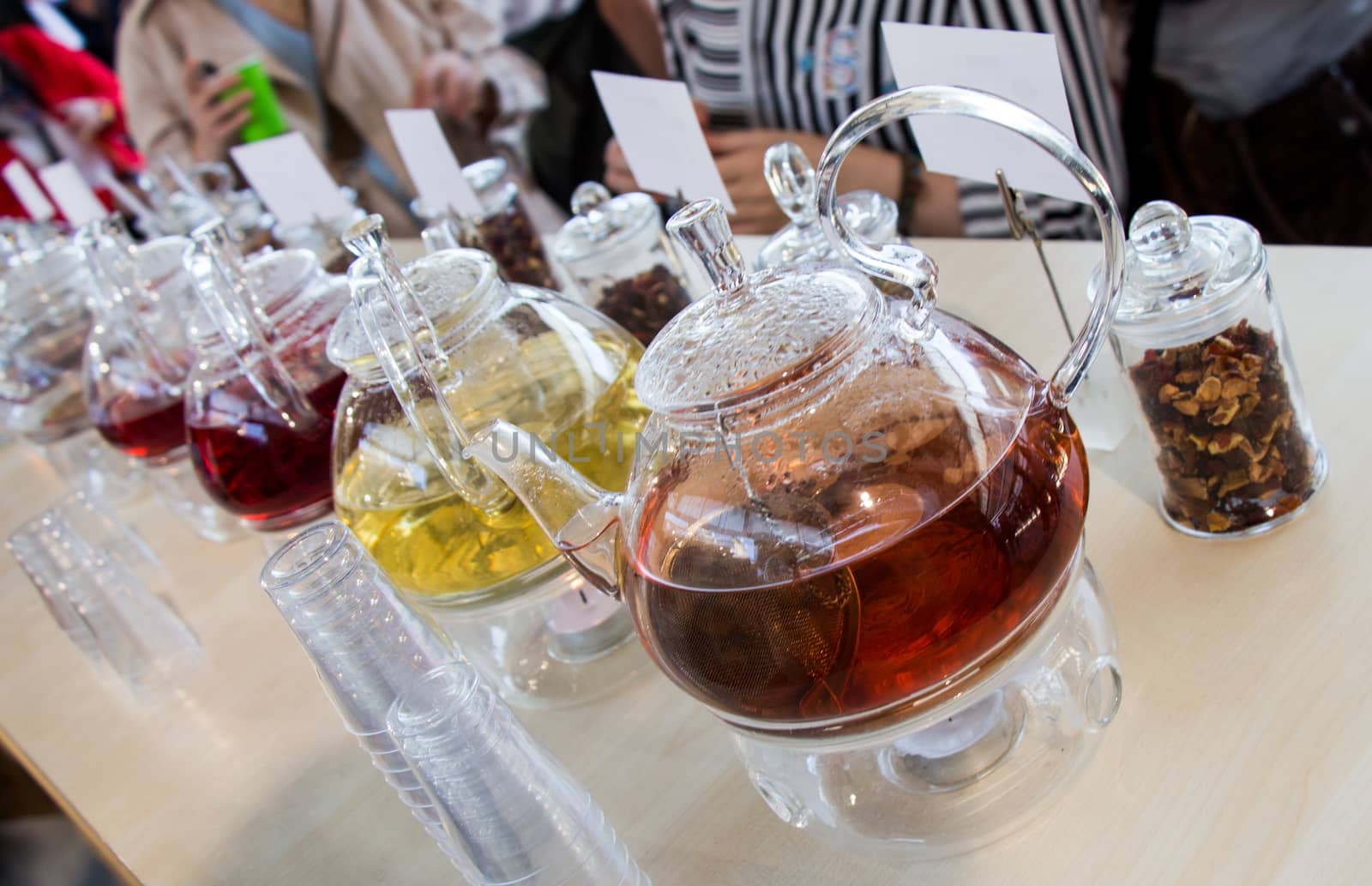 Herbal tea in teapot and tea plant in a bottle by berkay