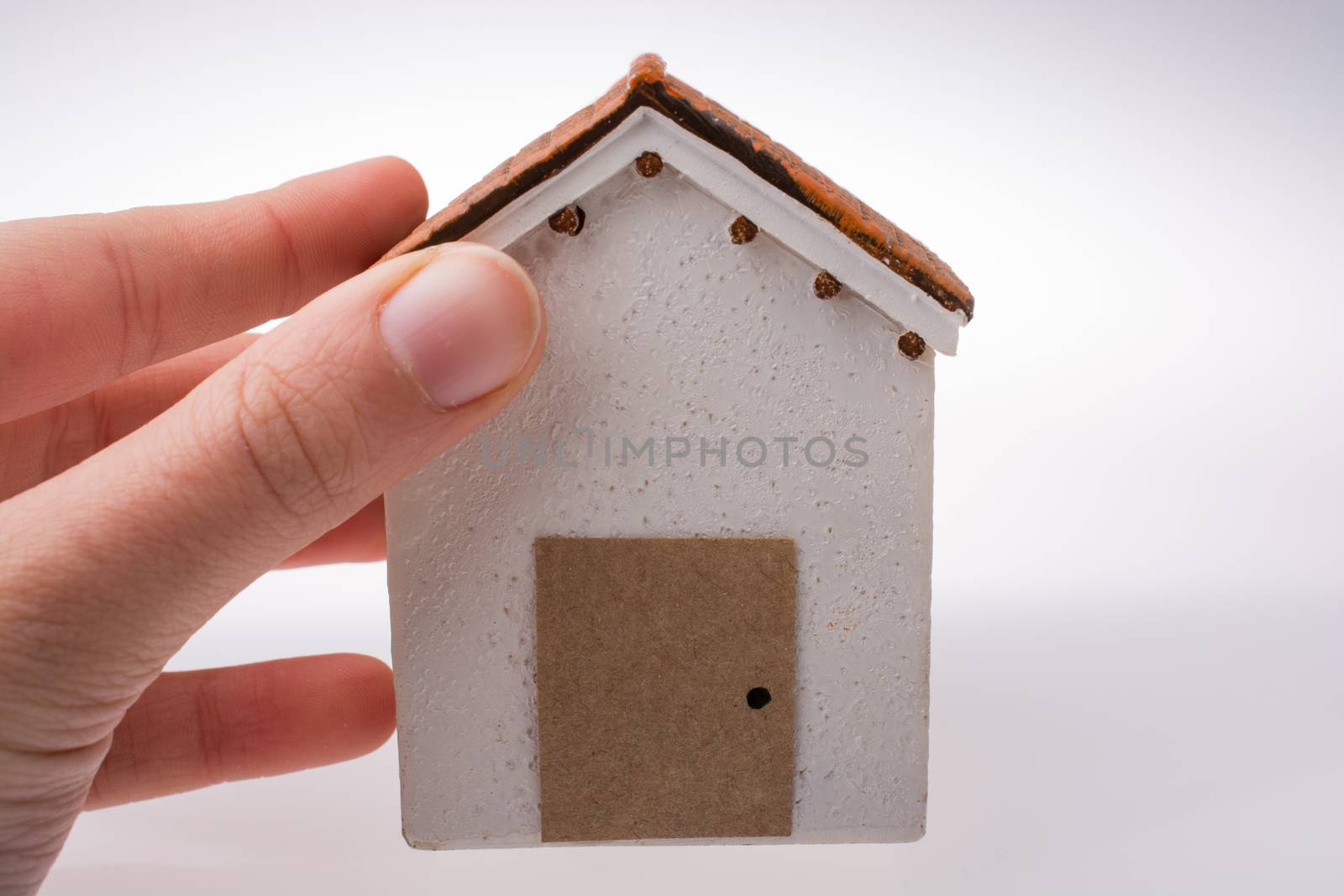 Little model house on a white background