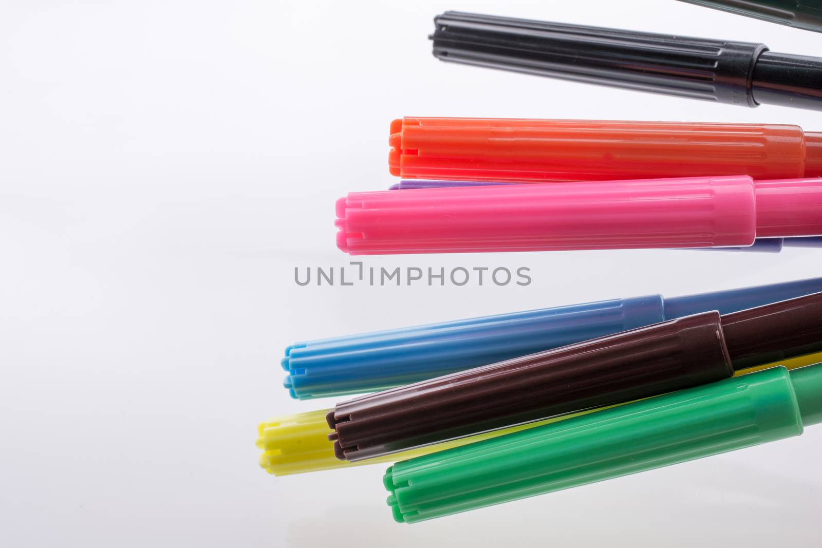 Color felt-tip pens  of various color on white background