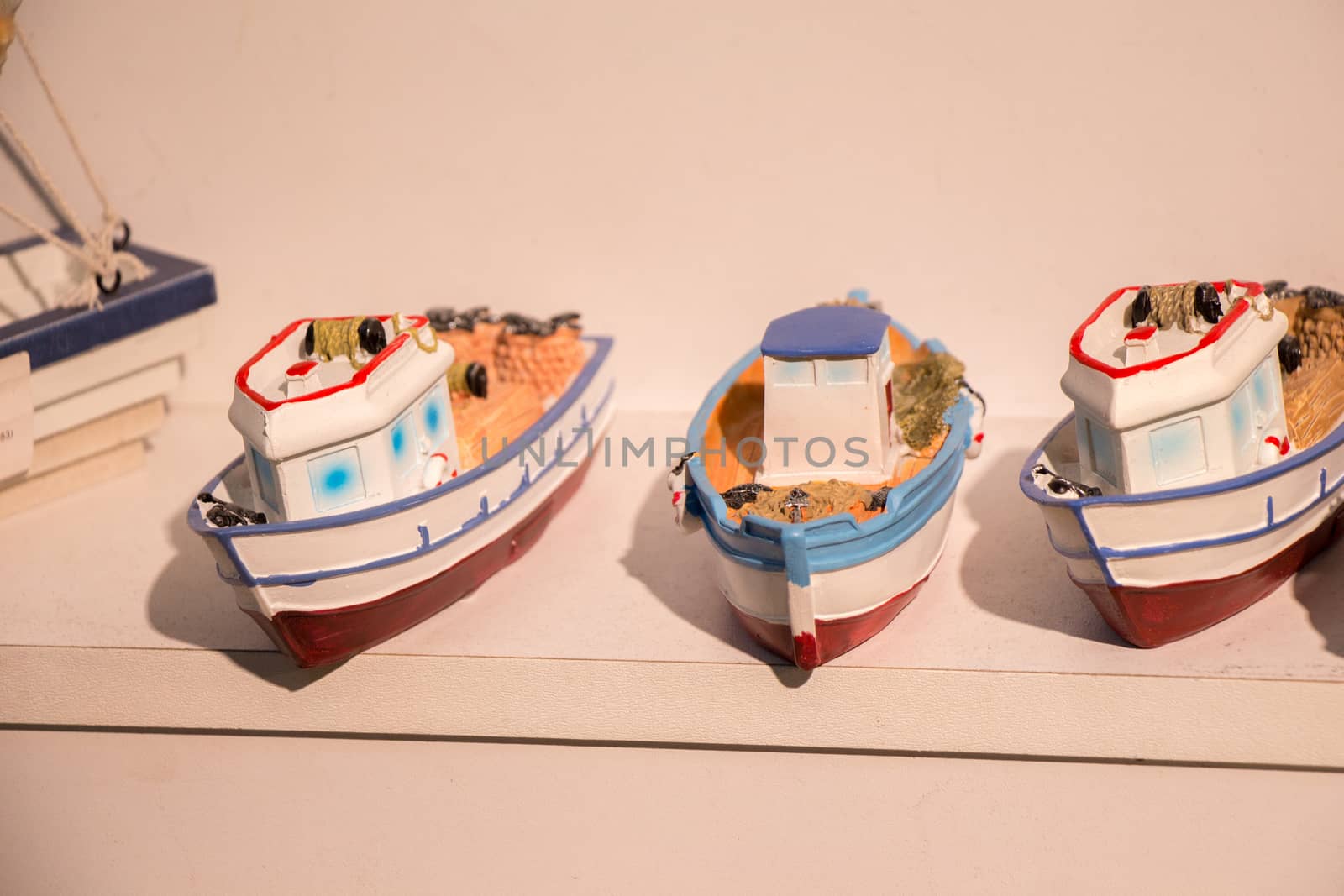 Set of small colorful wooden model boats