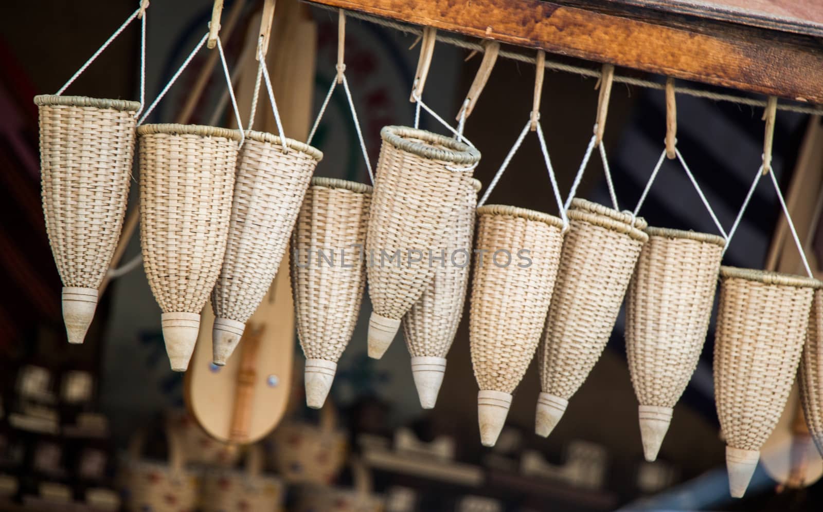 Empty wicker baskets are for sale in a market