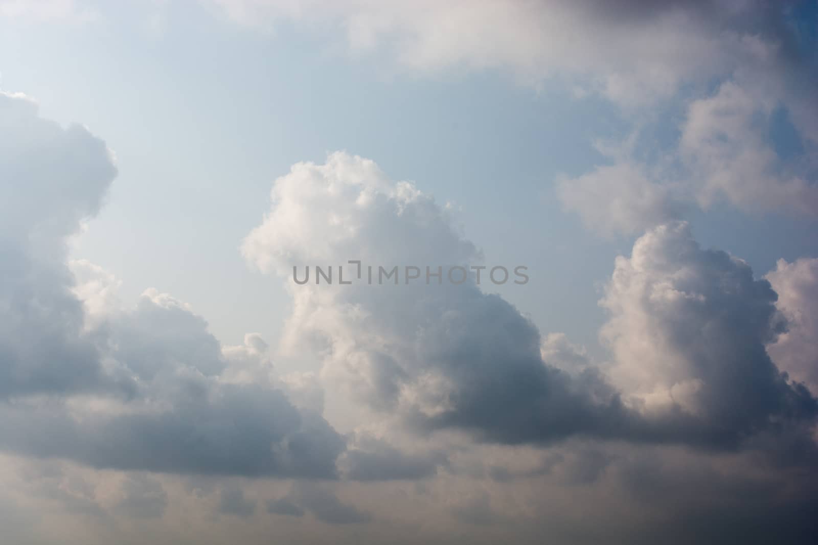 Dark and grey clouds are in the sky