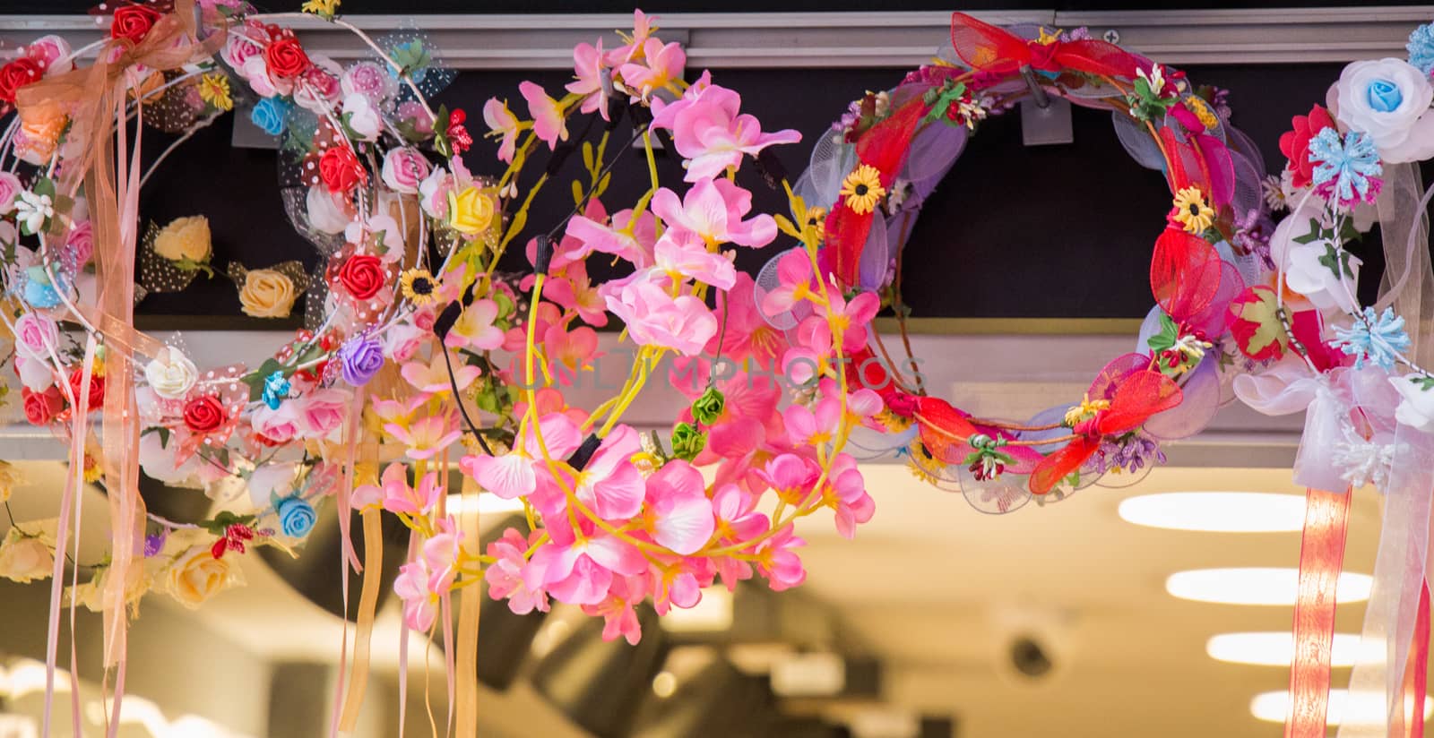 colorful crowns  for sale made of fake flowers