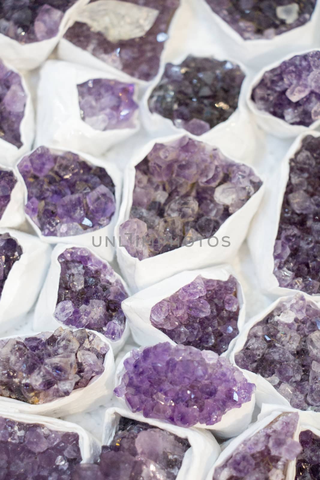 Raw violet amethyst rock with crystal ametist esoteric