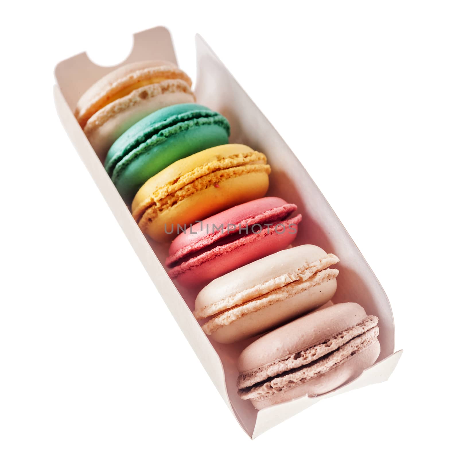 Sweet macarons. Different french cookies macaroons in a paper box