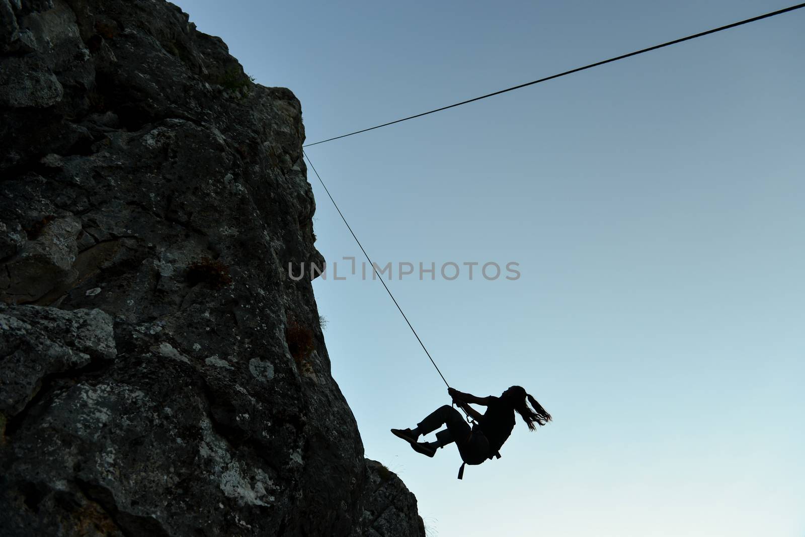 swinging rope in rock climbing