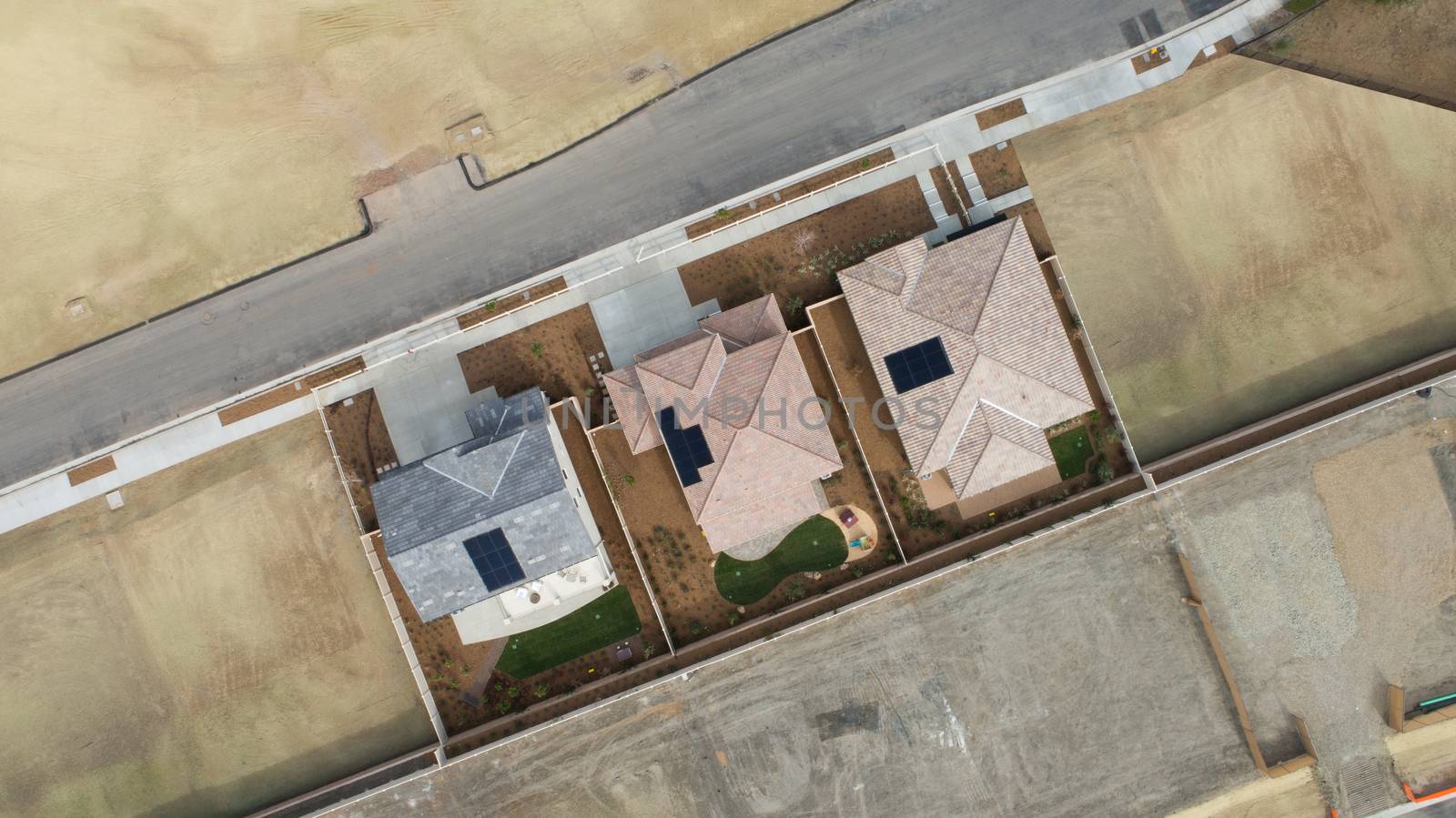 Drone Aerial View of Home Construction Site Final Stage by Feverpitched