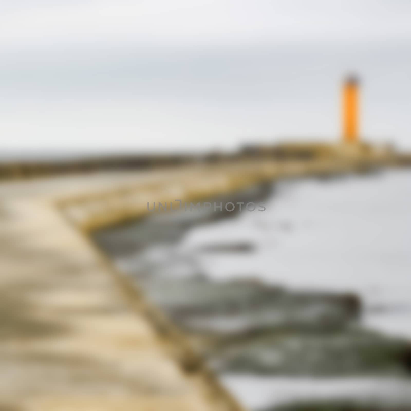 Yellow lighthouse - blurred image by sengnsp